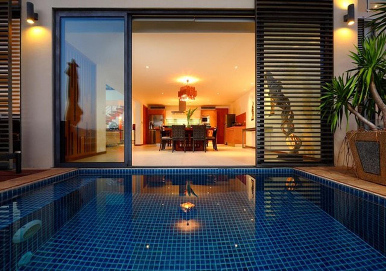 Indochine Resort And Villas - Sha Extra Plus Patong Bagian luar foto A pool at the hotel