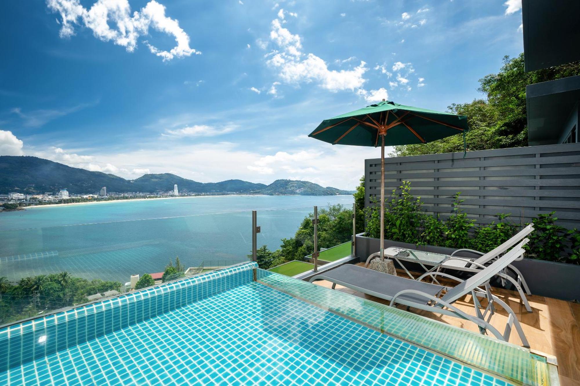 Indochine Resort And Villas - Sha Extra Plus Patong Bagian luar foto View of the Andaman Sea from the pool of a villa at the resort